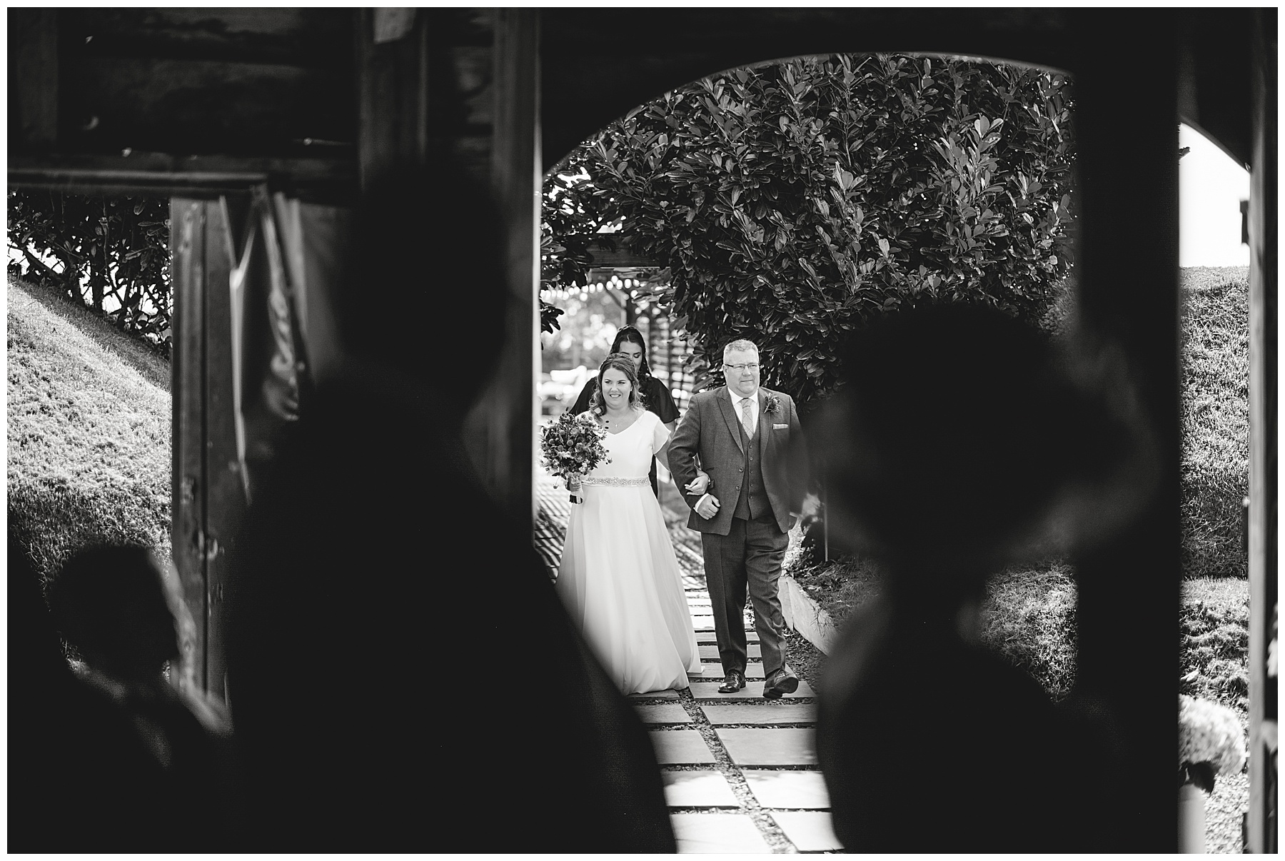 Bride arriving at Woodhouse Barn wedding