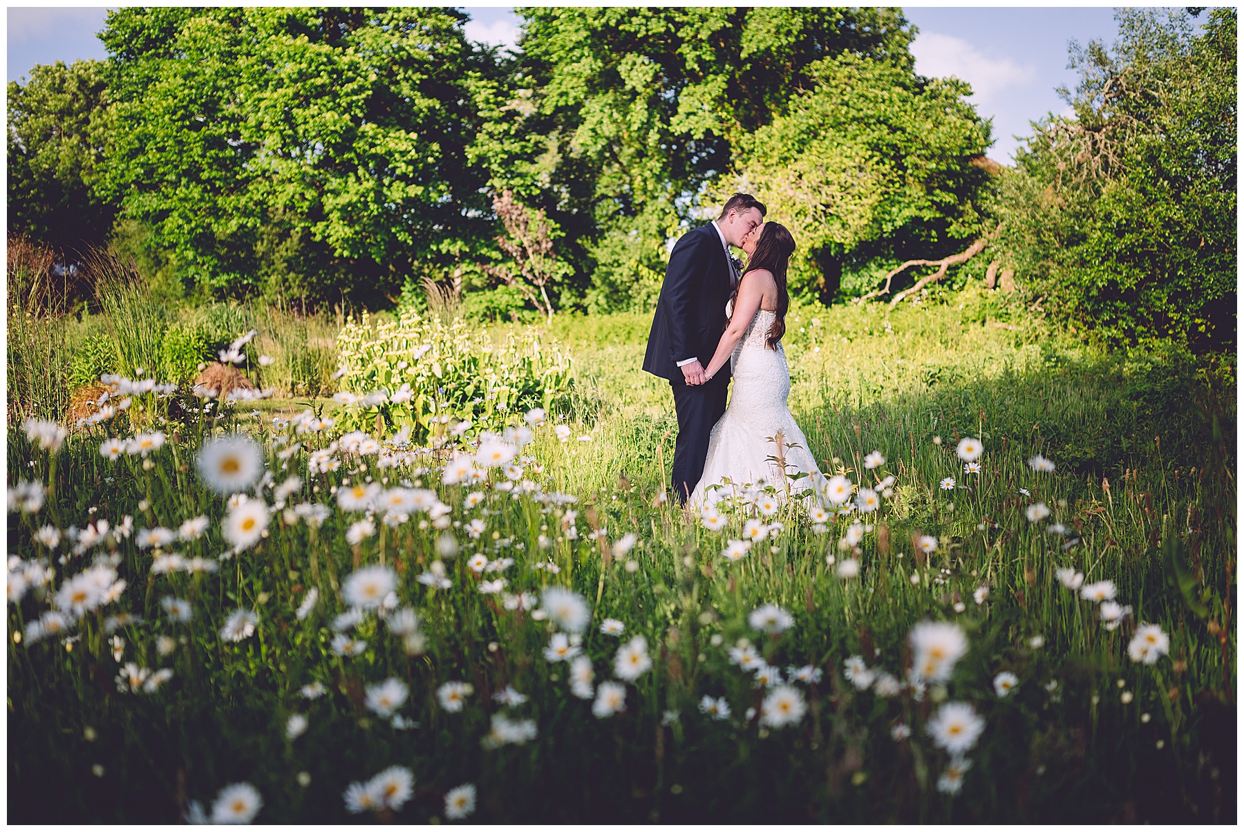 Bride & Groom in Wild Flower Meadow