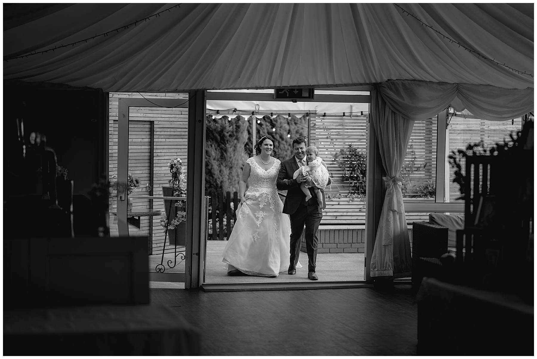 Bride & Groom Entering Wedding Reception