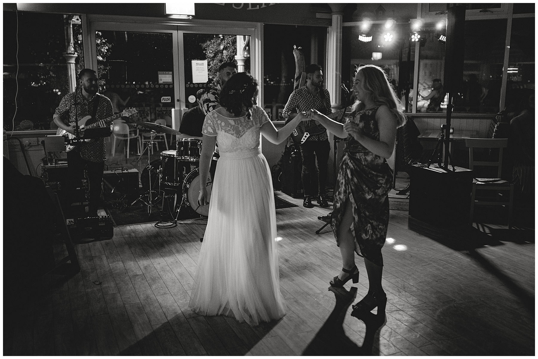Wedding Guests Dancing at Mumbles Beach Hut Cafe