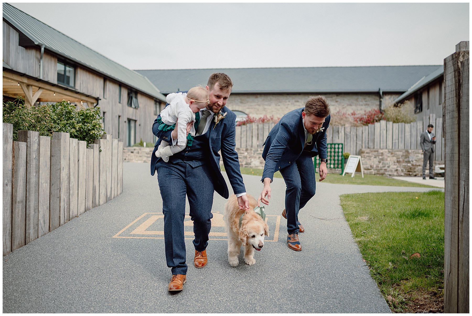 Groom with Dogs at Courtyard Wales