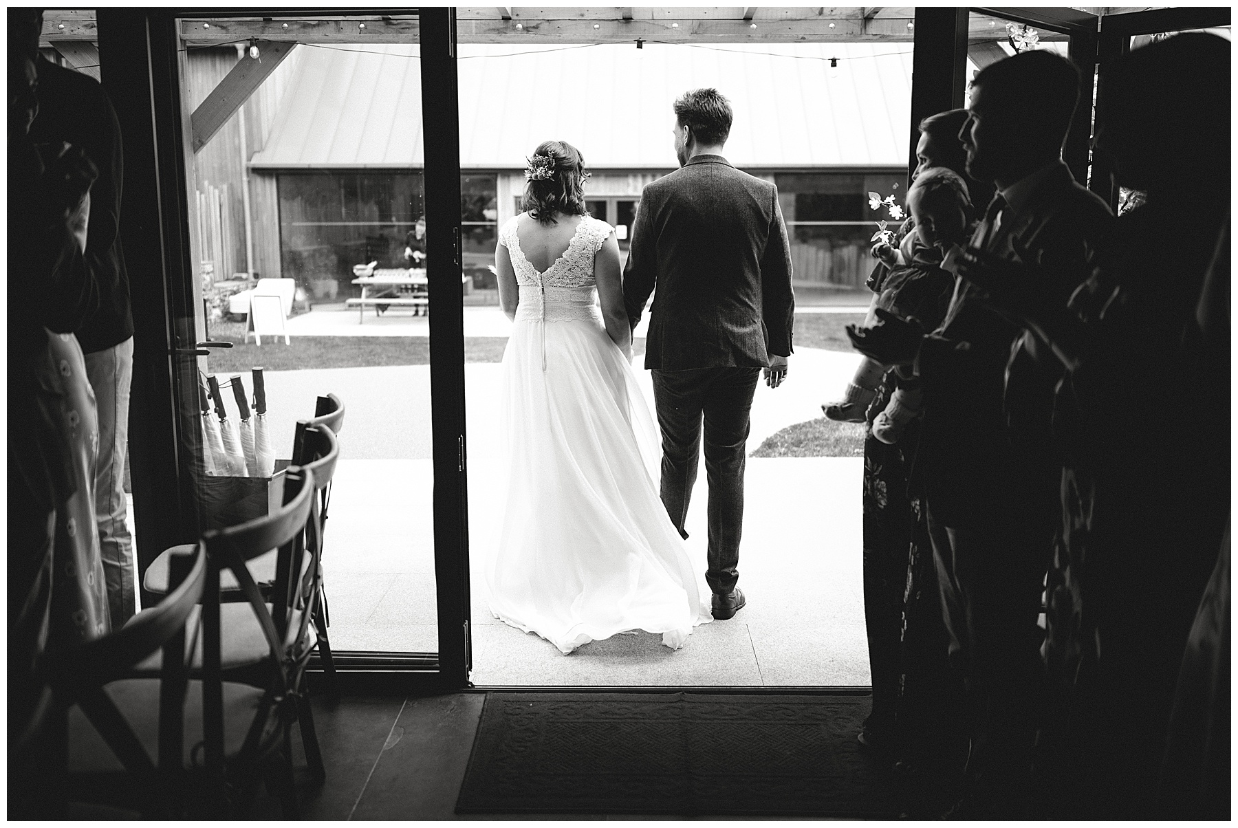 Bride and Groom Walking Down Aisle