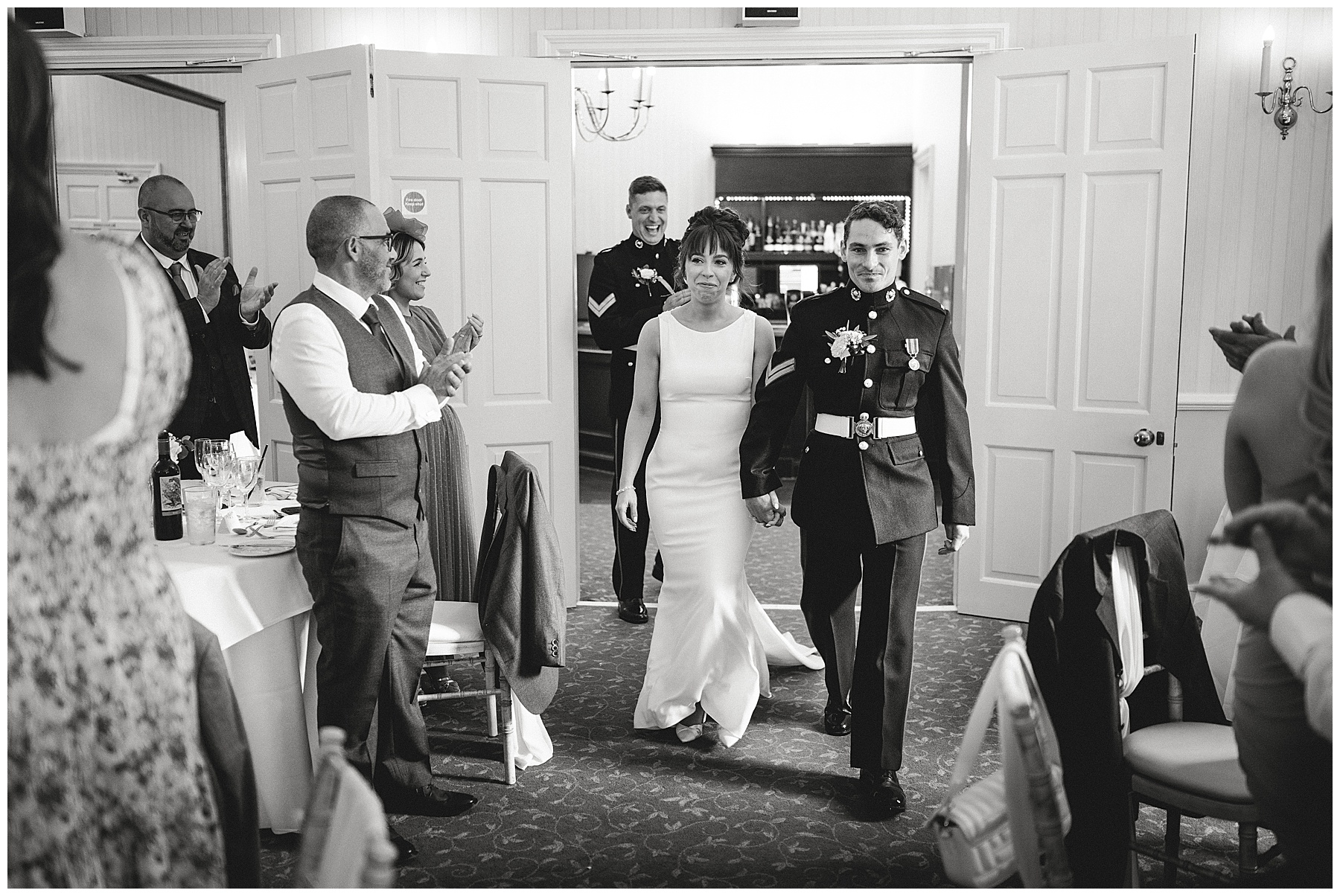 Bride & Groom Walking Into Wedding Reception