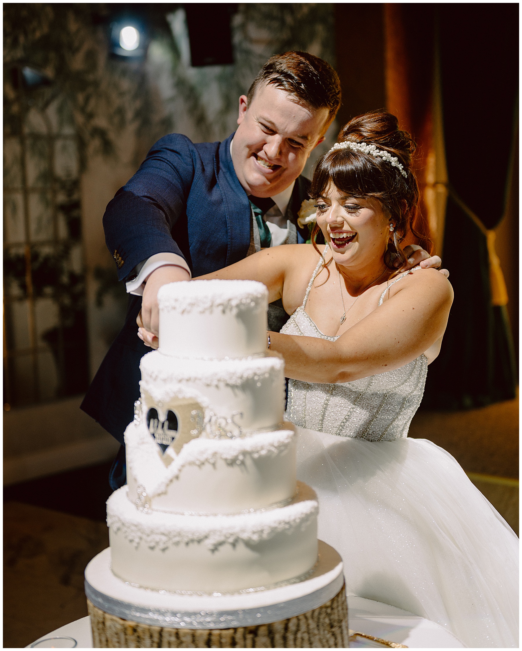 Bride & Groom Cut Wedding Cake