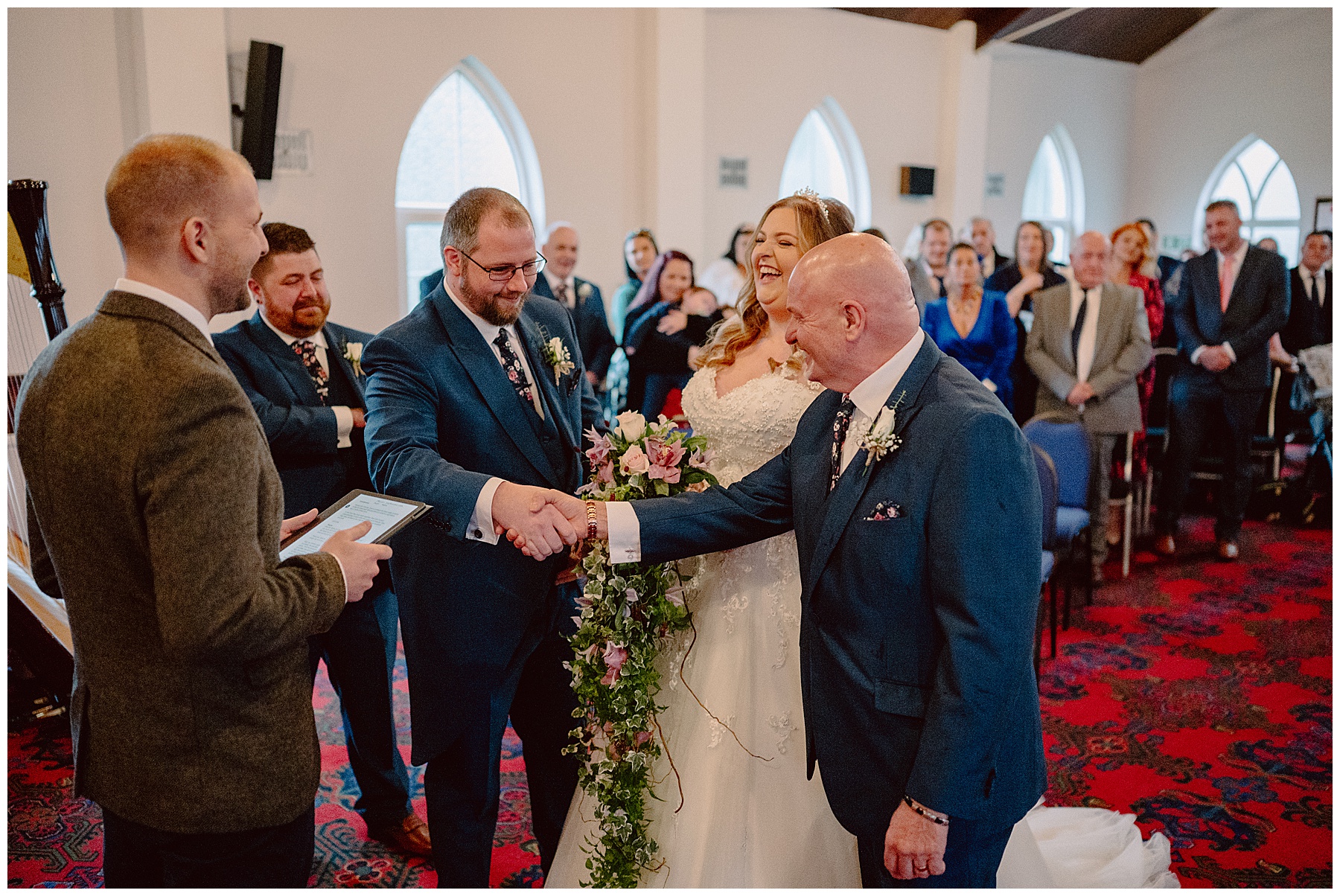Groom Shaking Hands With Father of Bride